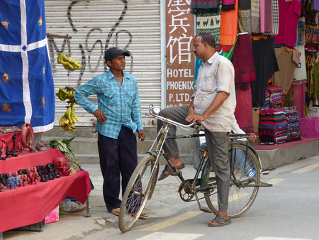 Kathmandu, Nepal, september 4, 2015: Two man chatting on the streetのeditorial素材