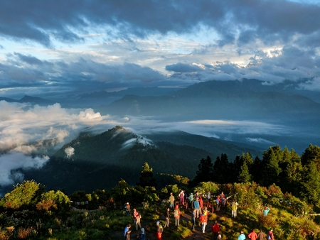 Ghorepani Poon Hill, Nepal, september 27, 2013: one of the most visited Himalayan view points in Nepal, Tourist looking to snow capped Himalayaのeditorial素材