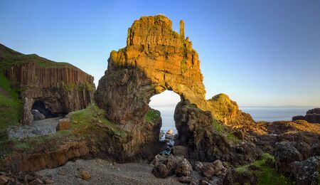 Carsaig Arches - rocks formation in sunset light, Isle of Mull, Scotlandの写真素材