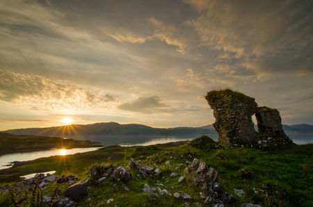 Ruins of Achadun Castle in sunset light, Isle of Lismore, Scotlandの写真素材