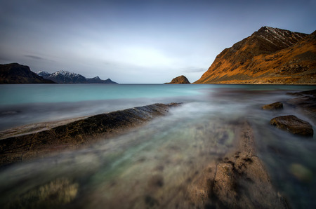 Rocks in the water at Flaget coastline, Lofoten
