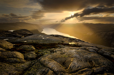 Sunset on Kvernafjellet cliff over Lysefjorden, Norwayの写真素材