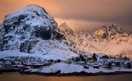 Village And he called Moskenesoya in orange evening light, Lofotenの写真素材