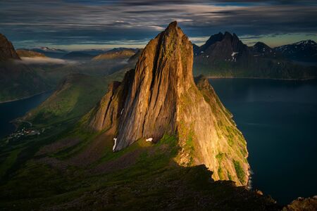 Segla and Fjordgard and Fjordgard village in sunset, Senja, Norwayの写真素材