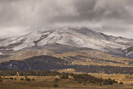 A beautiful photograph of some mountains and clouds.の写真素材