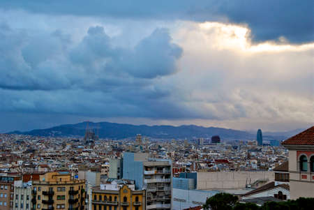 View of Barcelona from Montjuic Park with storm cloudsの写真素材