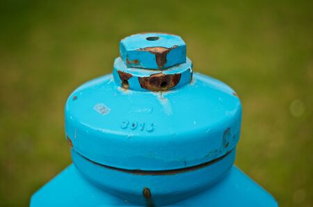 Old blue hydrant in detail