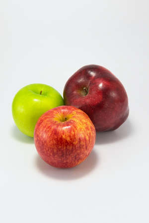 Three apple isolated on white background.の写真素材