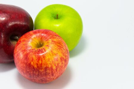 Three apple isolated on white background.の写真素材