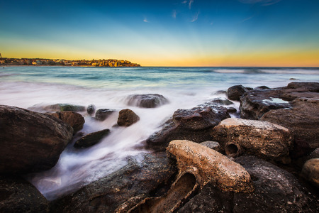 Beautiful sunset and waves at Bondi beach in Sydney, Australia.の写真素材