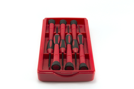 screwdriver and box isolated on white background.の写真素材