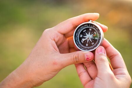 Compass on hand