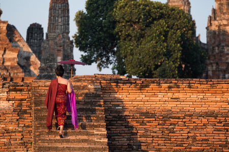 Female in Thai's traditional cloth in templeの写真素材