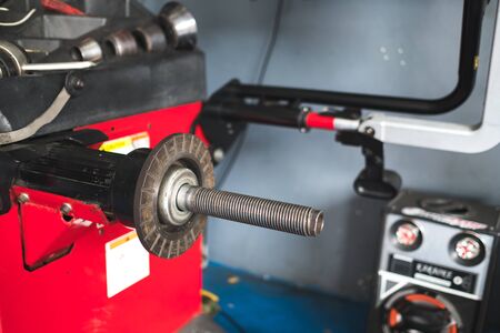 Close up car wheel balancing machineの写真素材