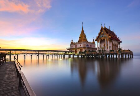 Wat Hong Thong (golden swan), a Thai temple that is built into the sea. At Chachoengsao, Thailand.の写真素材