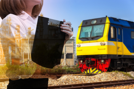 Multi exposure. Young business woman in Shipping business sceneの写真素材