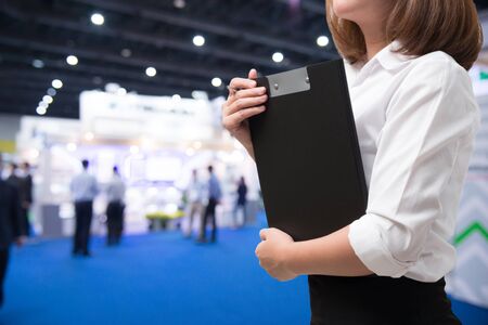 Business woman in exhibition eventの写真素材