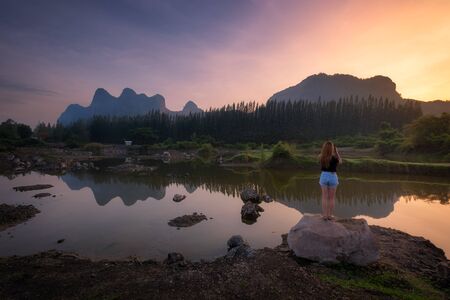 Beautiful view of sunrise sky view with reflection on lake at Khao e bid or Khao e go at Phetchaburi province, Thailand.の写真素材