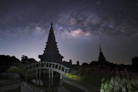 Milky way against Pagoda on Inthanon hill in Chiangmai, Thailandの写真素材