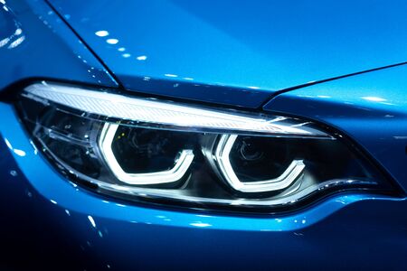 Detail of car LED headlights lamp of new carsの写真素材