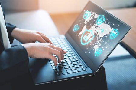 Internet security, online privacy concept, Abstract image of business woman using laptop under...