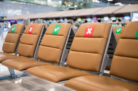 social distancing and physical distancing concept. keep spaced between each chairs make separate for social distancing in publicのeditorial素材