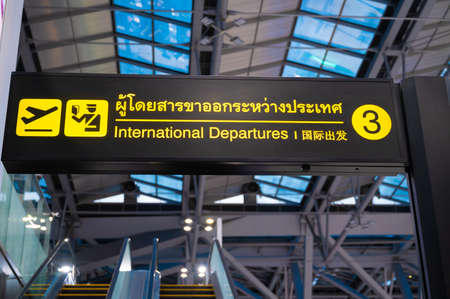 An information board international departure gate in airportのeditorial素材
