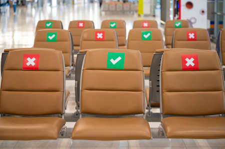 social distancing and physical distancing concept. keep spaced between each chairs make separate for social distancing in publicのeditorial素材