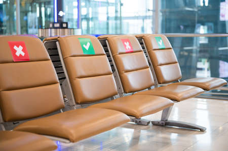 social distancing and physical distancing concept. keep spaced between each chairs make separate for social distancing in publicのeditorial素材