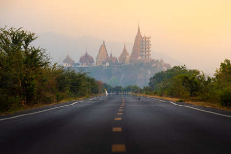 The road though Tiger Cave Temple (Wat Tham Sua) in Kanchanaburi, Thailandの写真素材