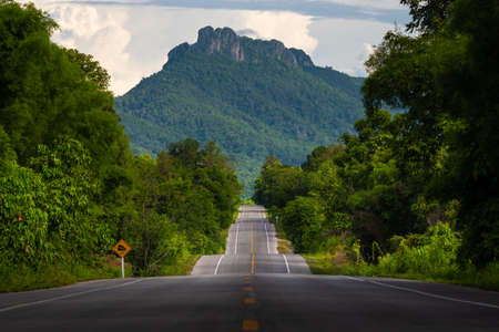 Bumpy asphalt road on hill in Lampang Thailandの写真素材