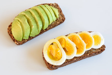 Wholemeal Sandwich with Avocado and Eggの写真素材