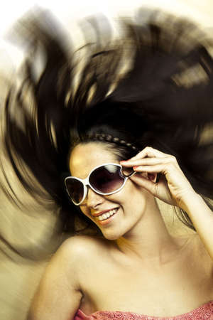 Portrait of beautiful young sexy woman wearing sunglasses の写真素材