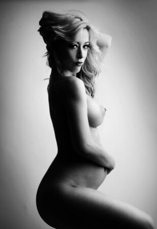 beauty glamor pregnant woman in black and whiteの写真素材