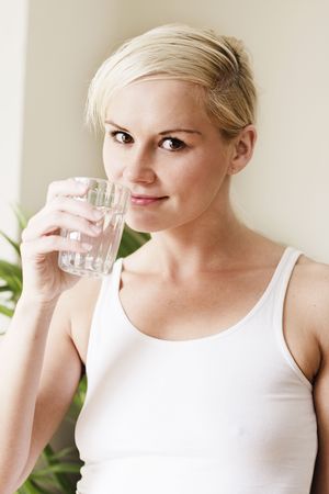 young woman Drinking waterの写真素材