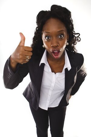 A pretty african american business woman with thumbs upの写真素材