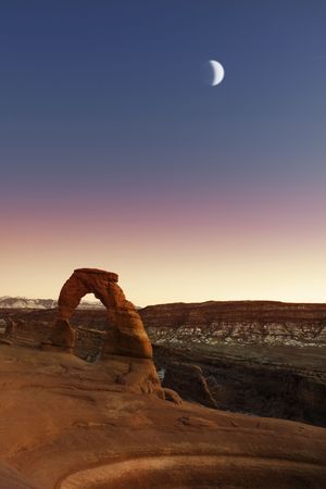 Delicate Arch in Arches National Park, Utah at sunset or moon light 
