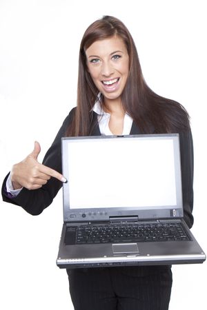 Young business woman showing blank laptop screen ready for your text and promotion, isolated on white background.の写真素材