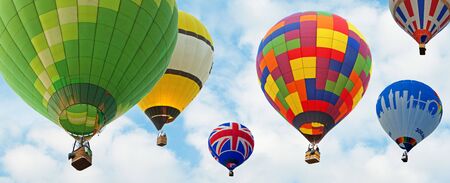 lot of hot air baloons with blue sky backgroundの写真素材