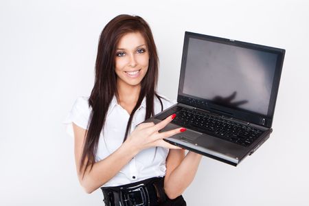 pretty businesswoman holding laptopの写真素材
