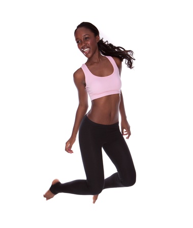 fitness black african woman during exercises on white background の写真素材