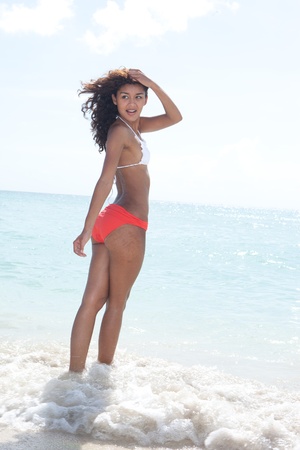 Asian Brunette Beautiful woman wearing bikini on the beach in Miami Beachの写真素材