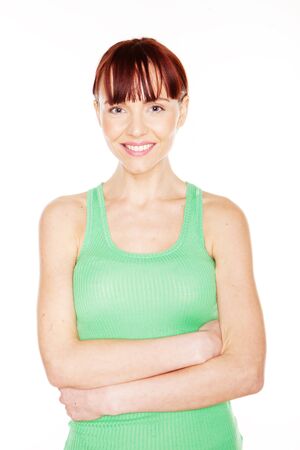Portrait of smilin redhead female on white backgroundの写真素材