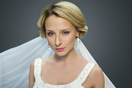 Portrait of beautiful young bride smiling to camera の写真素材