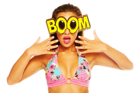 beautiful girl celebrating wearing boom sunglasses on whiteの写真素材