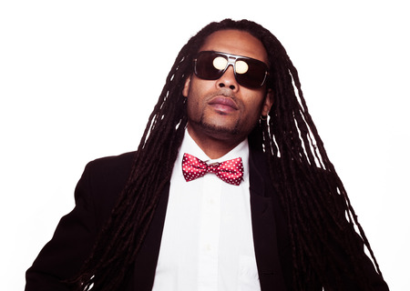 businessman wearing sunglasses and suit dreadlocksの写真素材