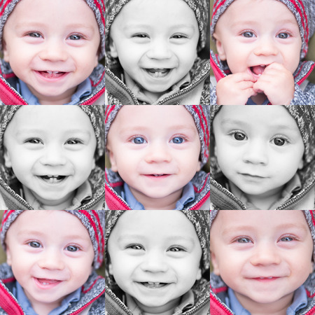 happy little baby boy wearing collage expressionsの写真素材