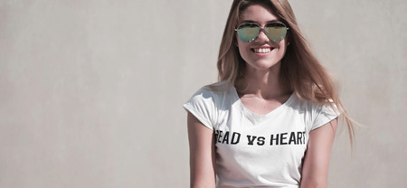 heppy young student smiling wearing sunglasses ,