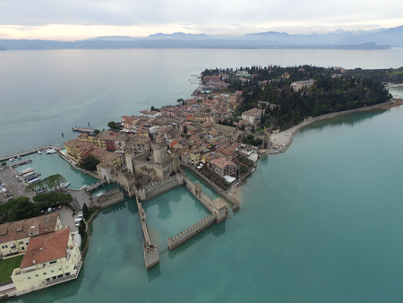 Aerial view of the Scaliger Castle in Sirmione by lake Garda, Italyの写真素材