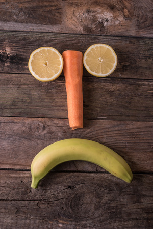 sad face emot made from fruits and vegetablesの写真素材